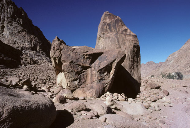 Free-standing, naturally sculpted rock pillars passed on way from St Catherine's Monastery in Wadi ed Deir (in distance on the right) to the Steps of Repentance, the most popular route for visitors climbing Mt Sinai.