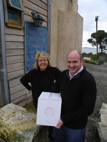 For good reason---a Fine Wine delivery---it's all smiles with Mark Fields, Sam Neill's "Two Paddocks" manager, and famous Fleur Sullivan, premier seafood restauranteur and superb, oft-times hilarious, hostess at "Fleur's Place" at the tiny fishing village of Moeraki in North Otago, New Zealand.