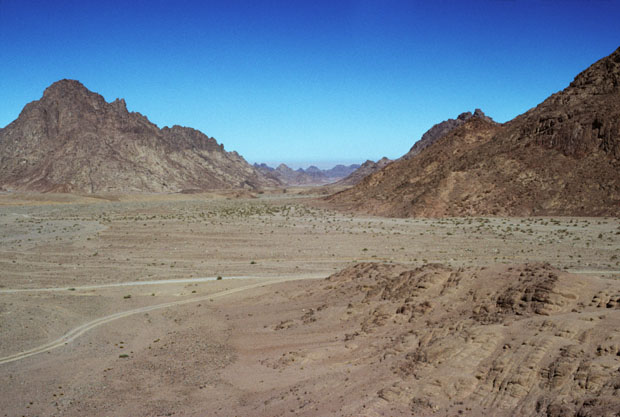 View from the lower end of Wadi es Sadad northwards towards its junction with Wadi Esh-Sheikh, the route from St Catherine's to the Gulf of Aqaba arm of the Red Sea. From here, in views in the opposite direction (see images 5, 7, 8 and 9), Mt Sinai can be seen. 