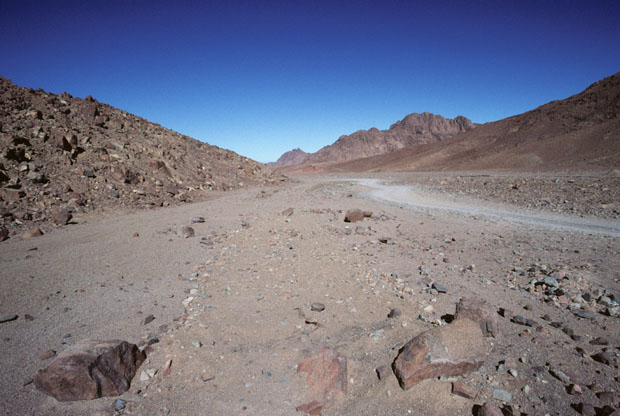 View from the southern part of Wadi es Sadad northward towards its junction with Wadi Esh-Sheikh, the route from St Catherine's to the Gulf of Aqaba arm of the Red Sea.   From here, in a view to the west (to the left in this image) Mt Sinai can be seen (image 4).     