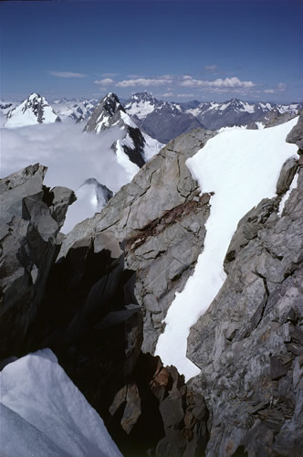 Weathering, partly by water-ice expansion splitting, of rock above neve of Tasman Glacier.