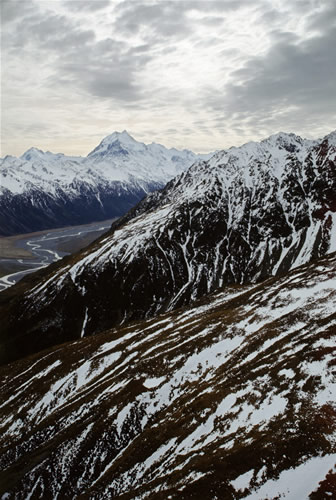 Mt Cook, on Main Divide, in distance; Burnett mountains in foreground; Tasman Valley in between.