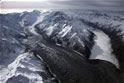 Northward view of confluence of Tasman Glacier (left) and Murchison Glacier (right) with Malte Brun Range between. The Hochstetter Glacier is seen entering from the mid-left; the Ball Glacier from the lower left.